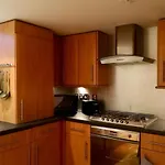 Central Mezzanine Apartment In Historic School