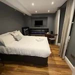 Cosy Double Bed With Fire Place