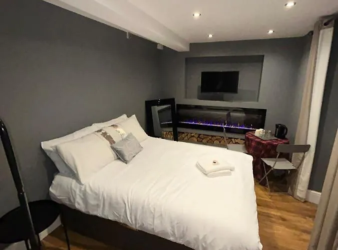 Cosy Double Bed With Fire Place